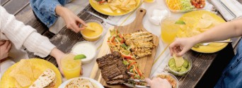 Chuy's Mamacita fajita bar with steak and chicken, tortillas, and toppings