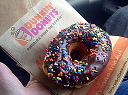 Dunkin' Catering Quick Pack with assorted donuts, bagels, and Munchkins for a team meeting