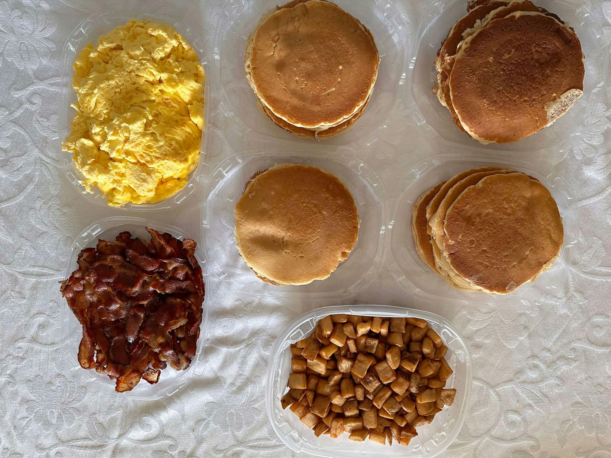 IHOP catering combo with buttermilk pancakes, scrambled eggs, and breakfast potatoes